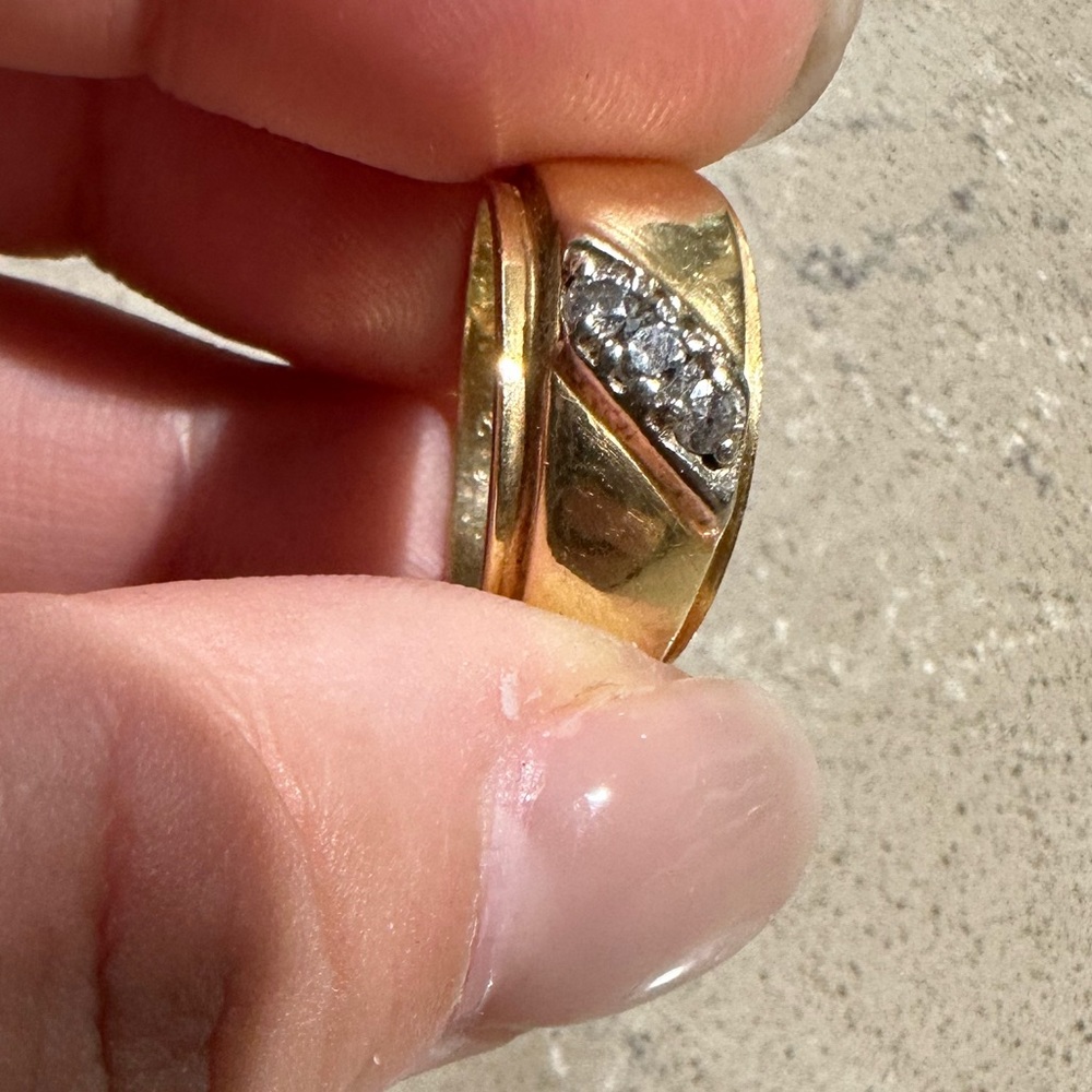 Gold wedding band with diamonds